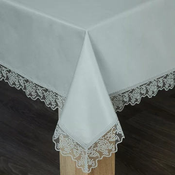 Reina asztalterítő exkluzív csipkével díszített 50% pamut és 50% poliészter ezüst színben
